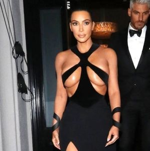 Kim K little black strappy dress